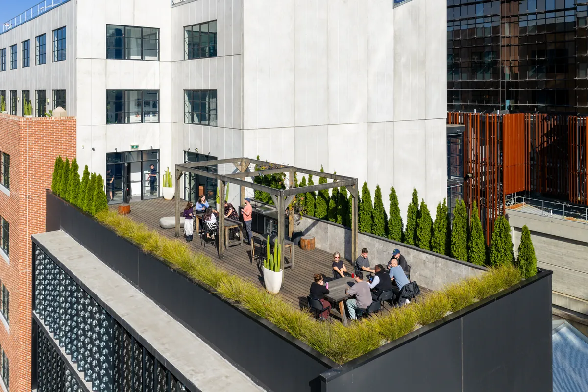 Aerial view of the rooftop terrace and building exterior, Clinibase office fitout, Collingwood.