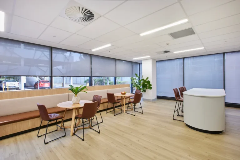 Banquette breakout seating with cafe tables at the Endress and Hauser office fitout, Mulgrave.