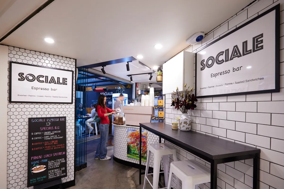 Sociale Espresso Bar with white-tiled walls and counter at the Exchange Tower office refurbishment, Melbourne.