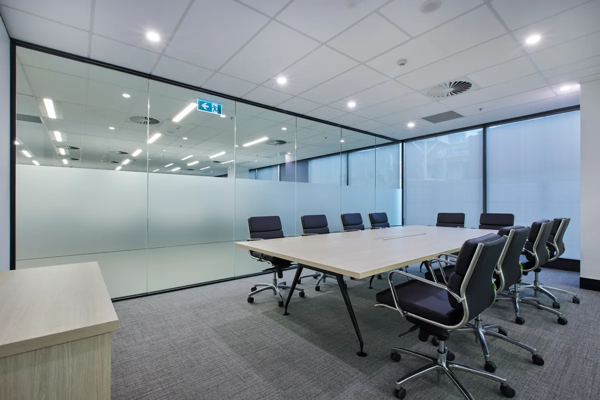 Boardroom with large meeting table and executive chairs, Growthpoint spec suite fitout, Mulgrave.