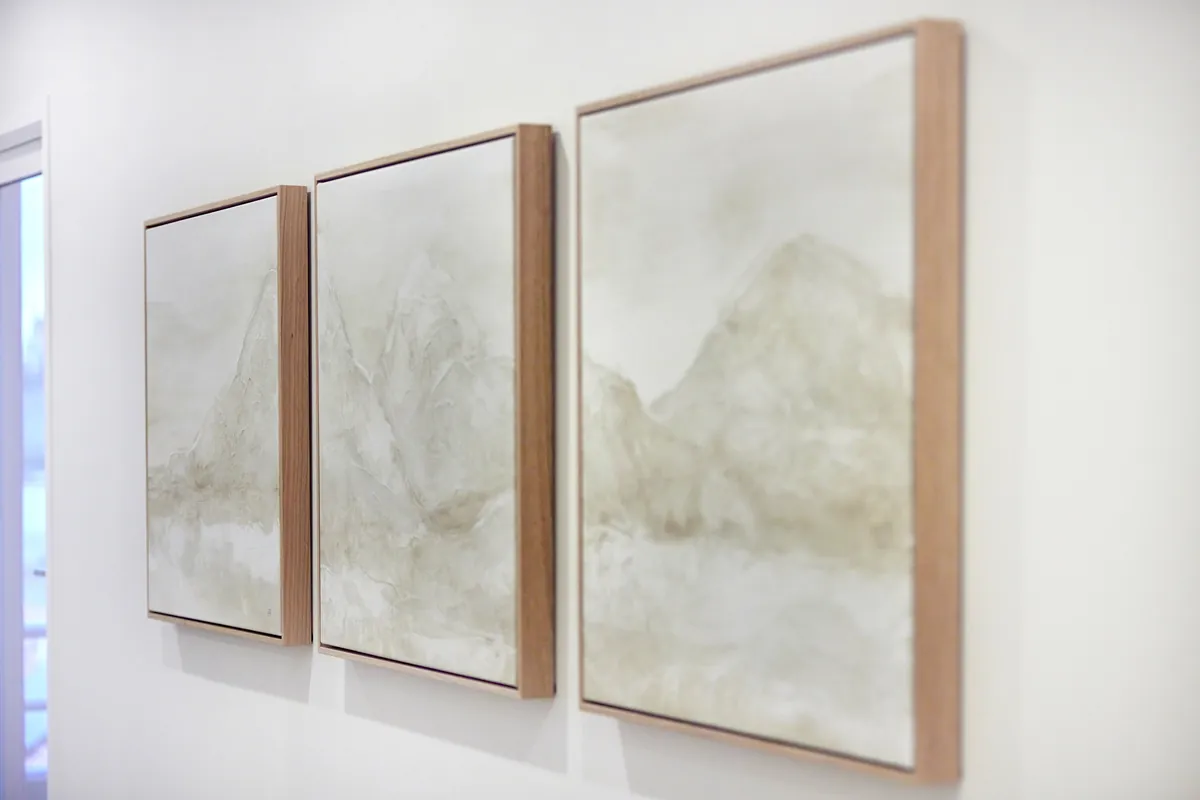Framed triptych artwork in timber frames at the Kew Periodontics dental clinic fitout, Kew.