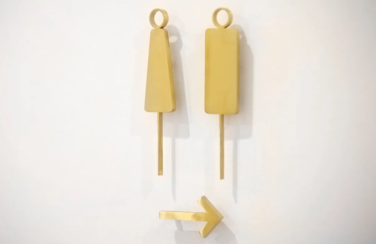 Brass amenities and directional wayfinding signage at the Kew Periodontics dental clinic fitout, Kew.