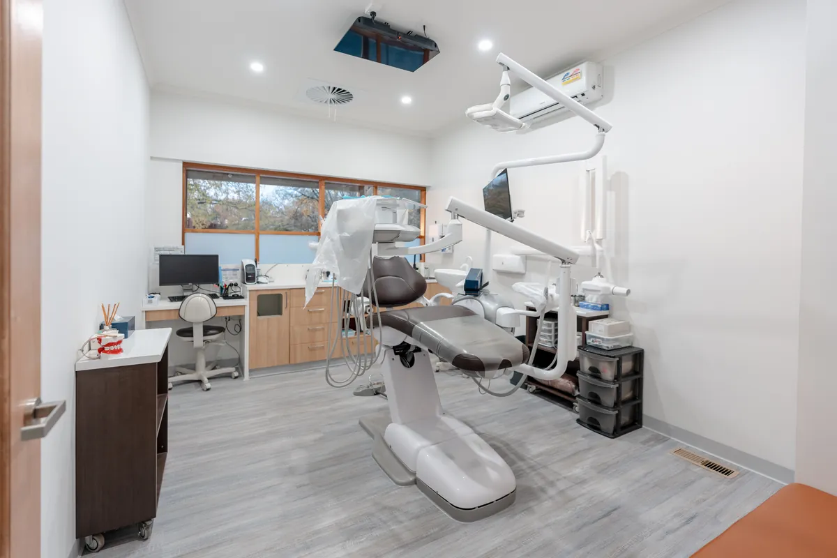 Dental surgery with treatment chair and joinery at the Kyneton Dental dental clinic fitout, Kyneton.