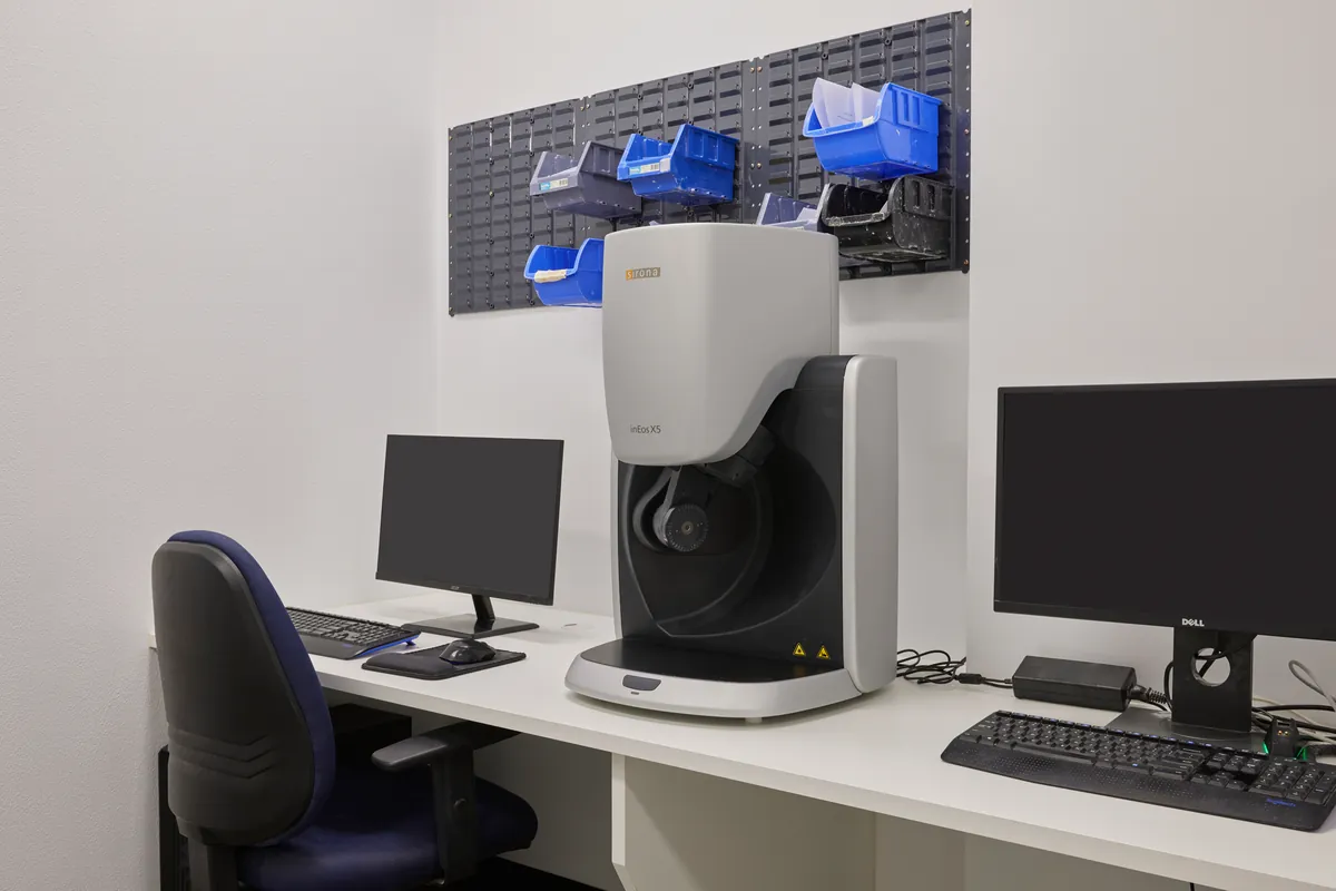 Intraoral scanning station with dual monitors in the Melbourne Smiles dental clinic fitout, North Caulfield.