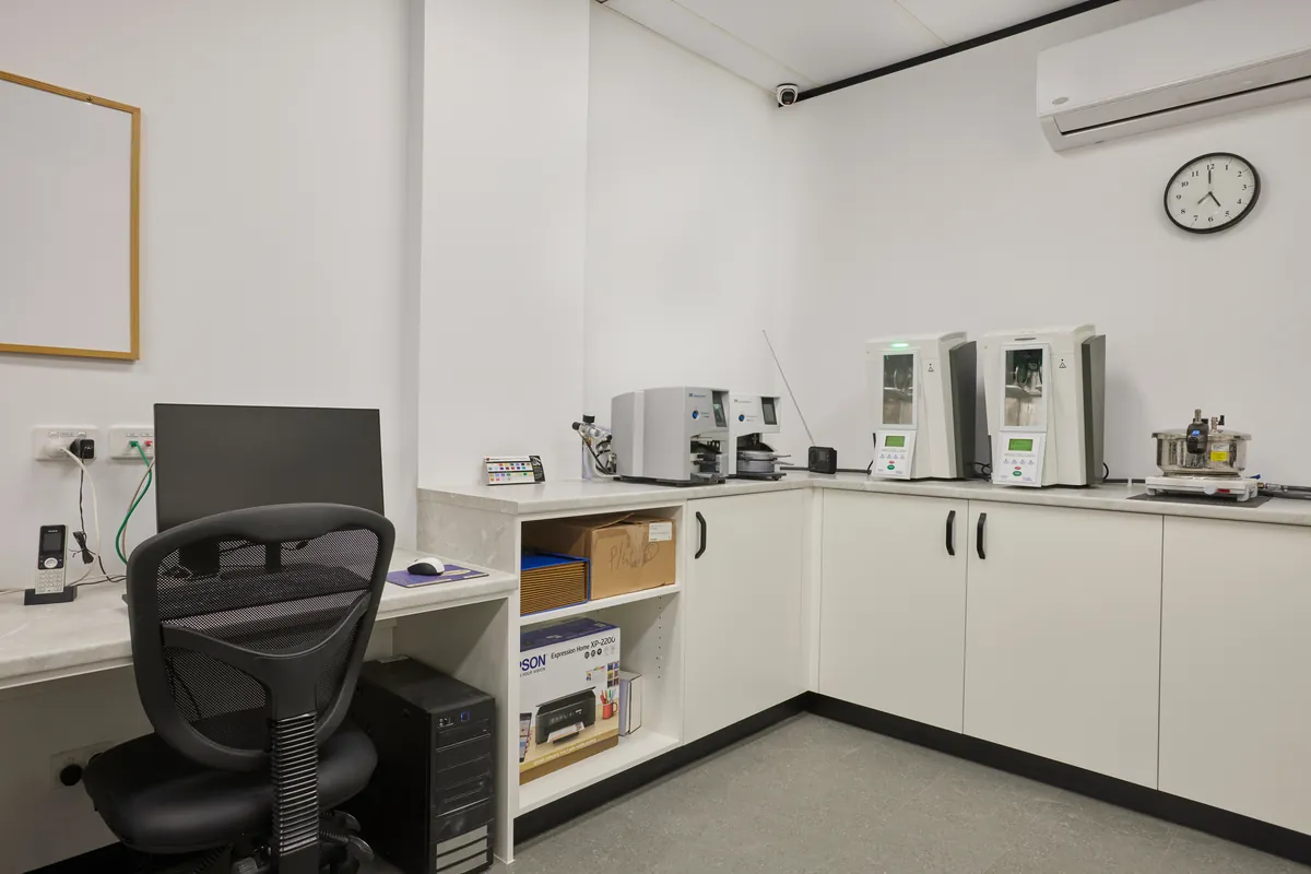 Lab production bench and workstation with dental equipment, Melbourne Smiles dental clinic fitout, North Caulfield.