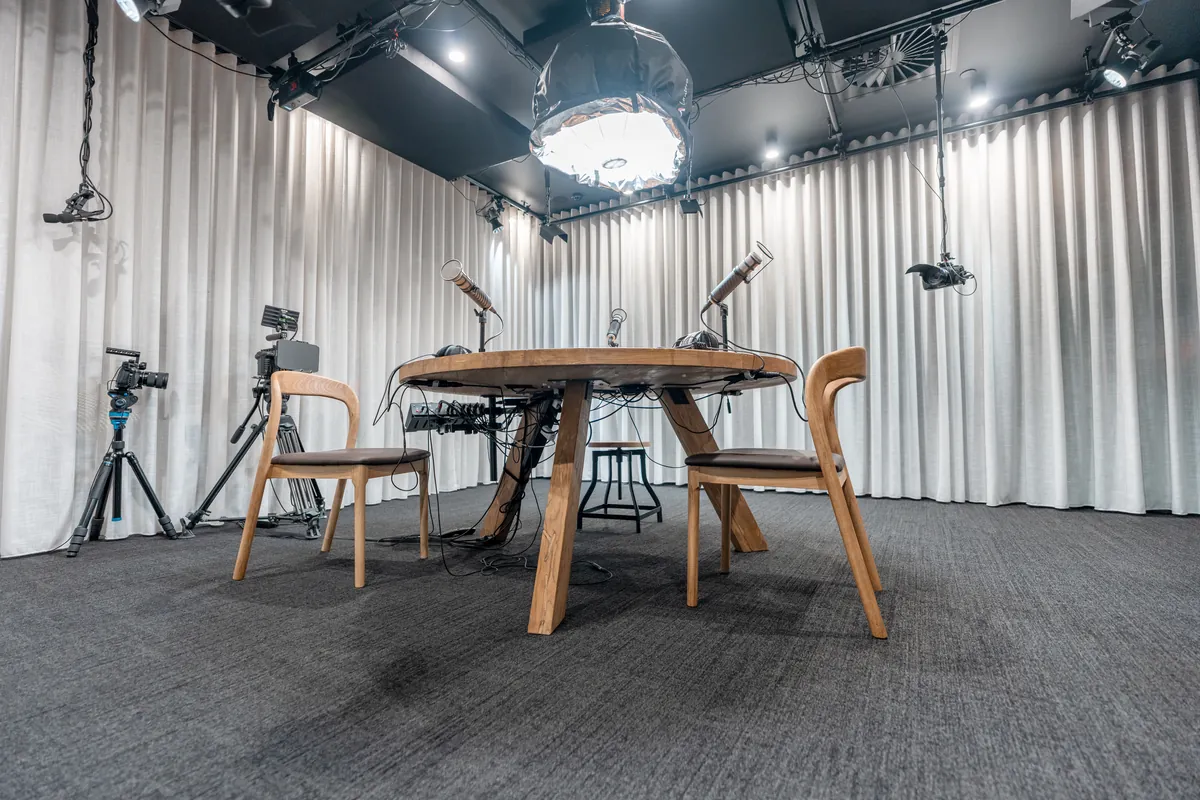 Acoustic podcast and video studio with curtained walls and cameras, Resilience Project office fitout, Collingwood.