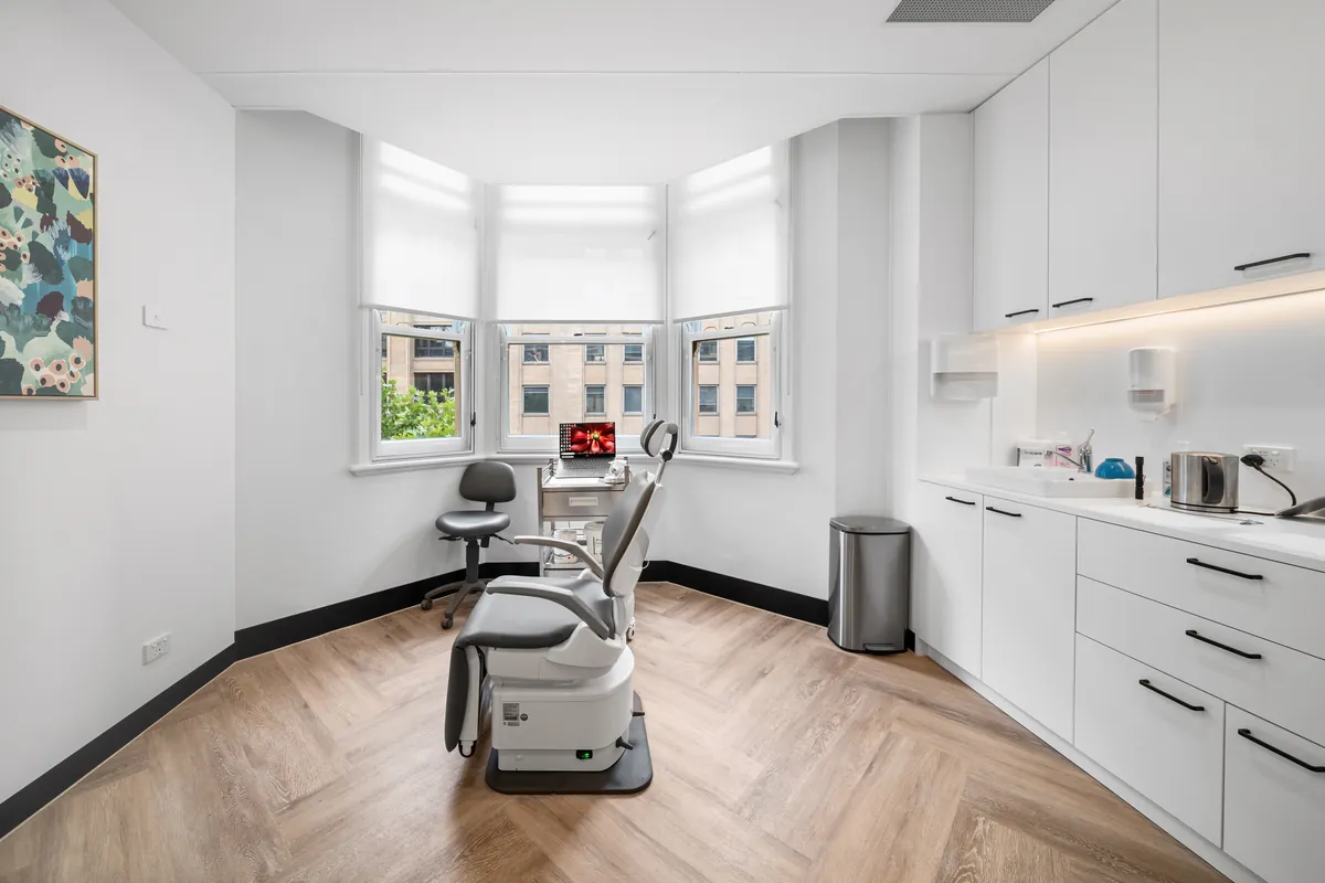 Dental surgery with treatment chair and bay window at the SleepWise Clinic dental clinic fitout, Melbourne.