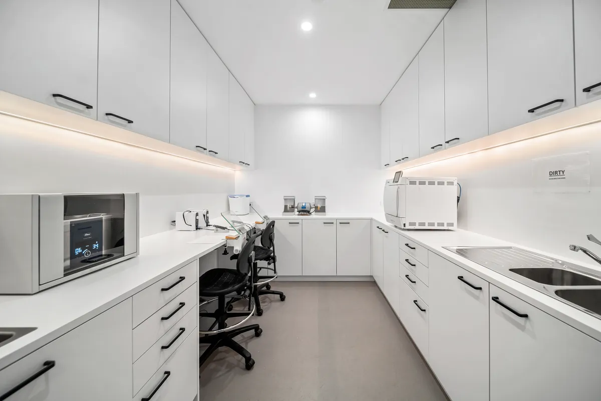 Sterilisation room with clean and dirty zones at the SleepWise Clinic dental clinic fitout, Melbourne.