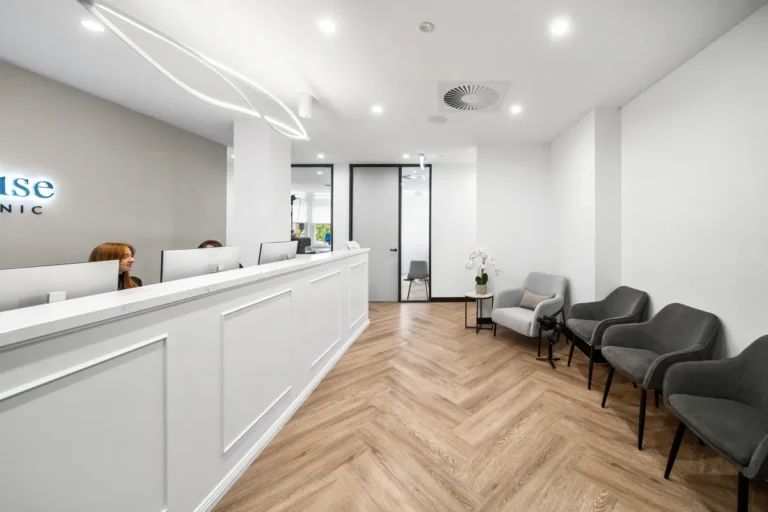 Reception desk and patient waiting area at the SleepWise Clinic dental clinic fitout, Melbourne.